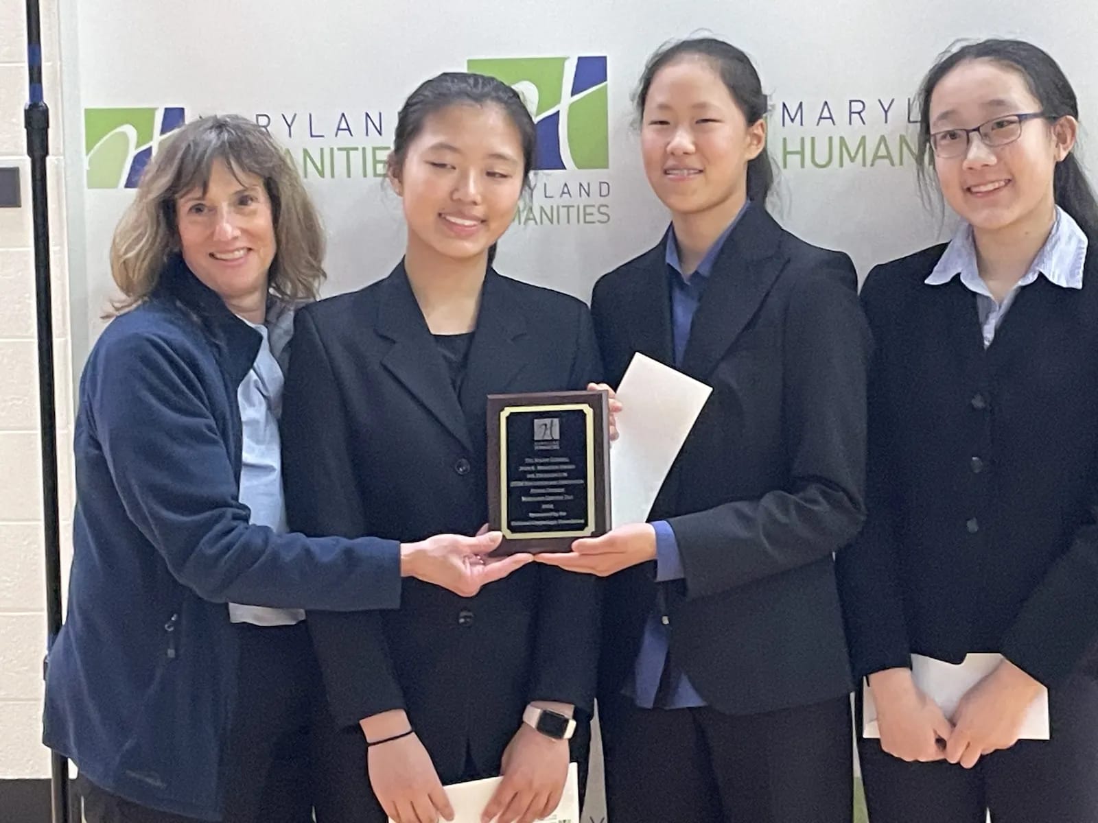 NCF Christine Harding with Annabelle Liang, Claire Sun, and Eileen Wu Jr Division Gen Morrison.png