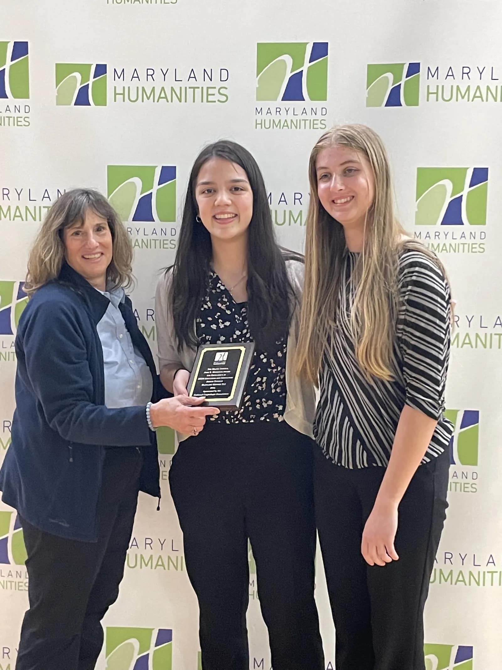 NCF Christine Harding with 2024 Senior Division Jordan Fain & Nora Devine Not pictured Samantha Lavallee.png