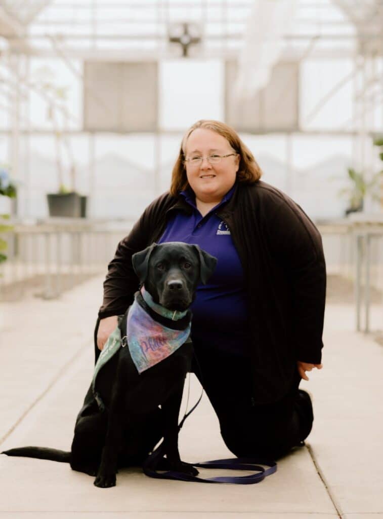 Mother with child tethered to her Autism Assistance Dog