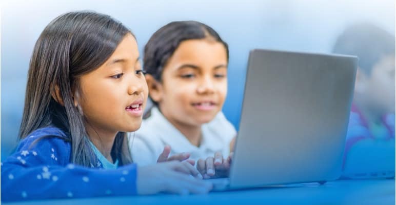 nav resources two young students learning on laptop