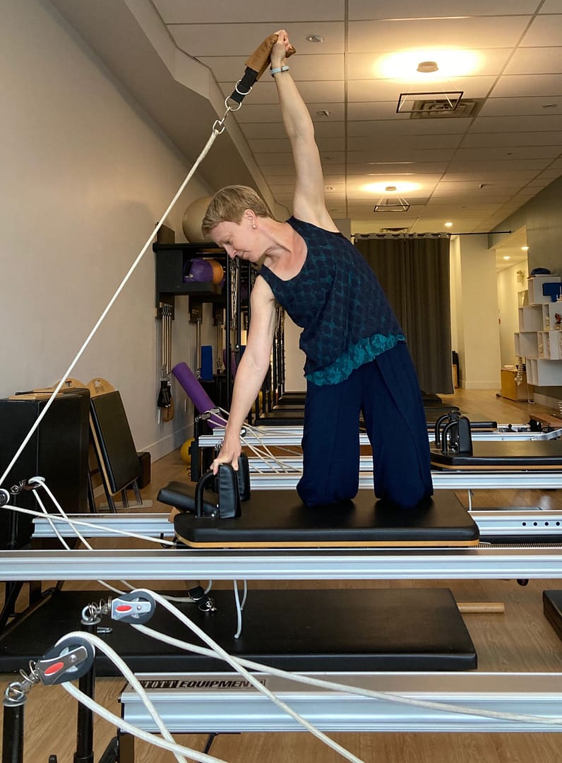 Pilates Reformer Pilates arm exercise on the Reformer