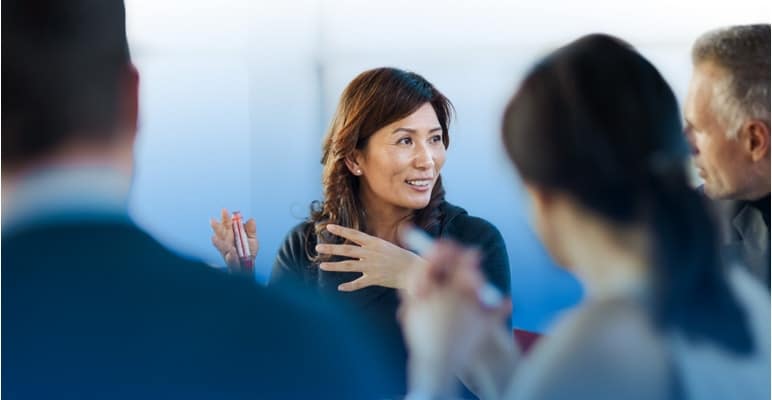 nav about us group of professionals in conversation